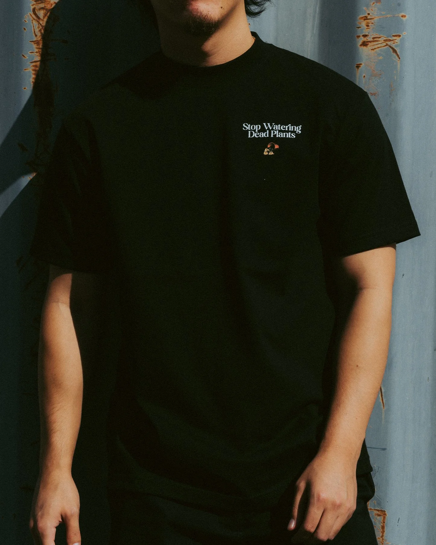 Stop Watering Dead Plants Tee - Image 3